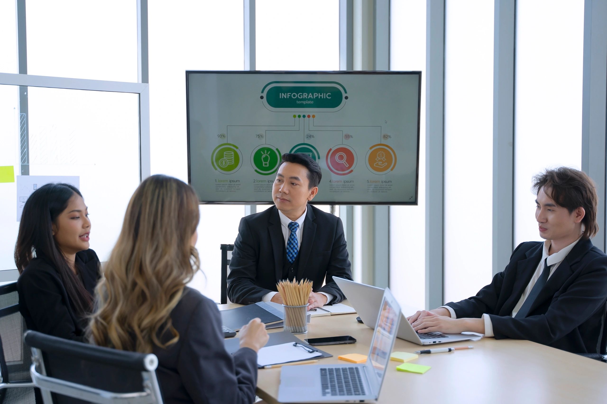 Professional team collaborating in a modern office